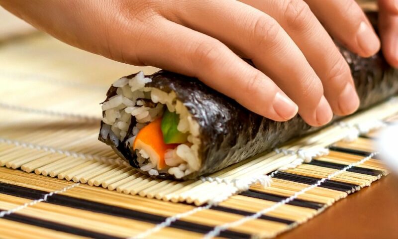 Can I use regular rice instead of sushi rice for making sushi